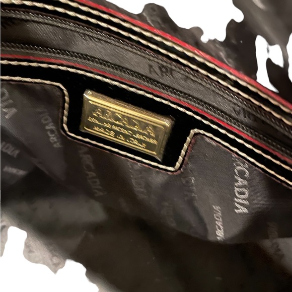 Black, embossed  patent leather tote w/ red trim. Beautiful work bag. - Picture 3 of 5